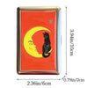 A vintage metal card holder featuring a design of a crescent moon and a black cat on an orange background.