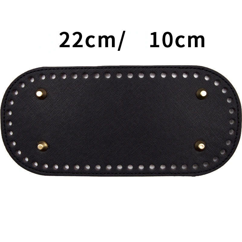 Schwarze, strapazierfähige PU-Tasche mit Nieten, Maße 22x10 cm.