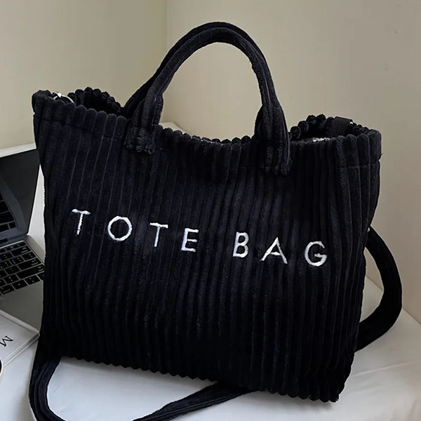Schwarze gestreifte Samt-Tasche mit weißer Aufschrift TOTE BAG