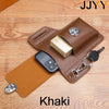 A brown leather waist bag with a belt clip, holding a phone and other items, placed on a wooden surface.