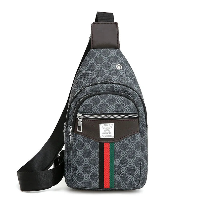 A dark gray patterned sling bag with a brown strap and black accents.