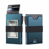 A teal minimalist metal card holder displaying cash and cards.