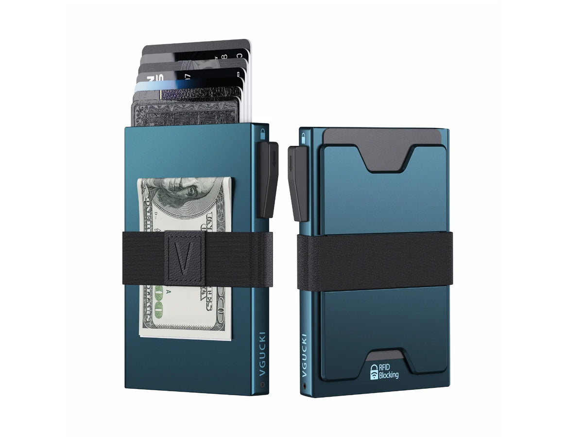 A teal minimalist metal card holder displaying cash and cards.
