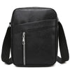 Black waterproof PU leather sling bag with a zippered compartment and adjustable strap.
