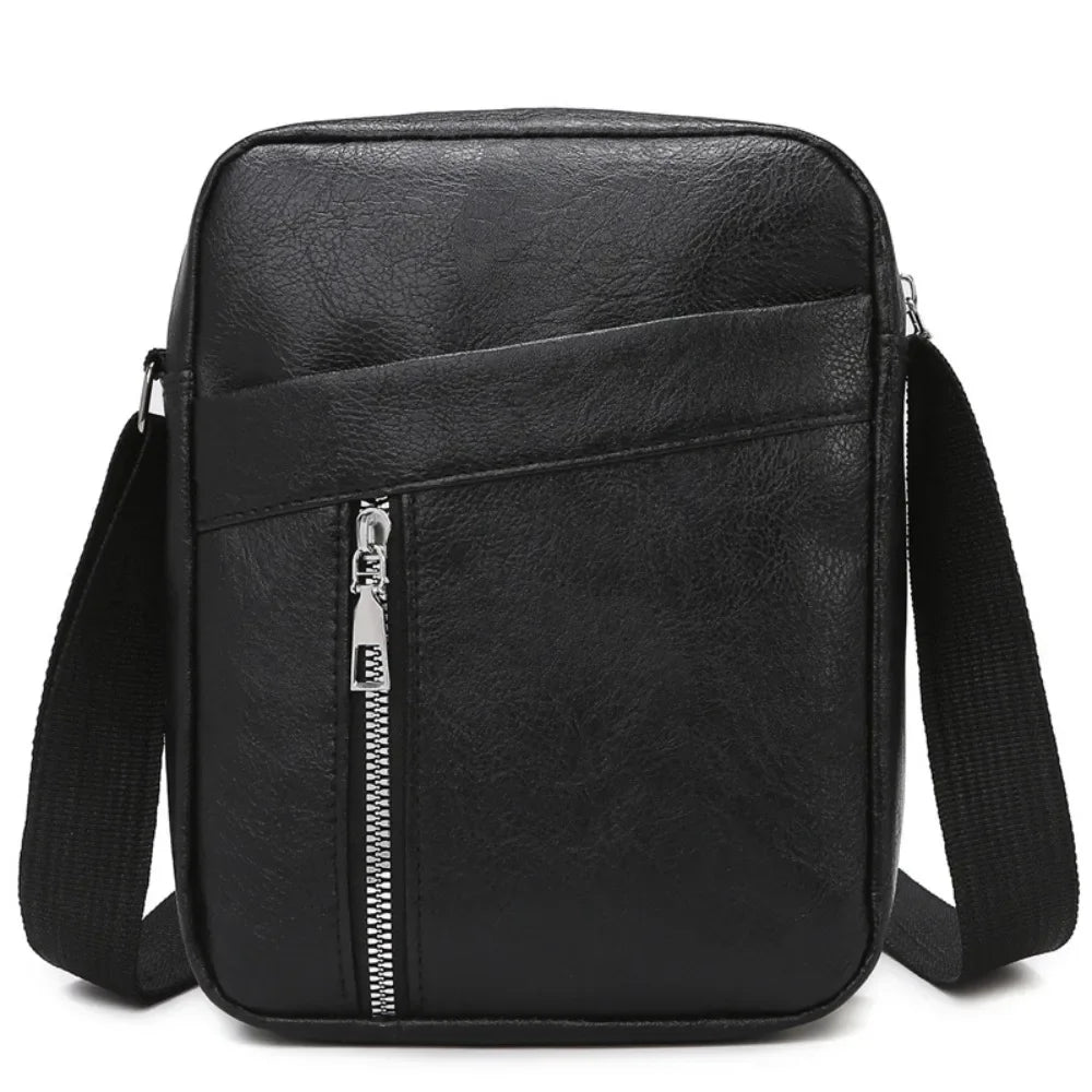 Black waterproof PU leather sling bag with a zippered compartment and adjustable strap.