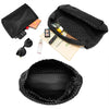 Black handwoven faux leather tote bag and matching clutch with small accessories