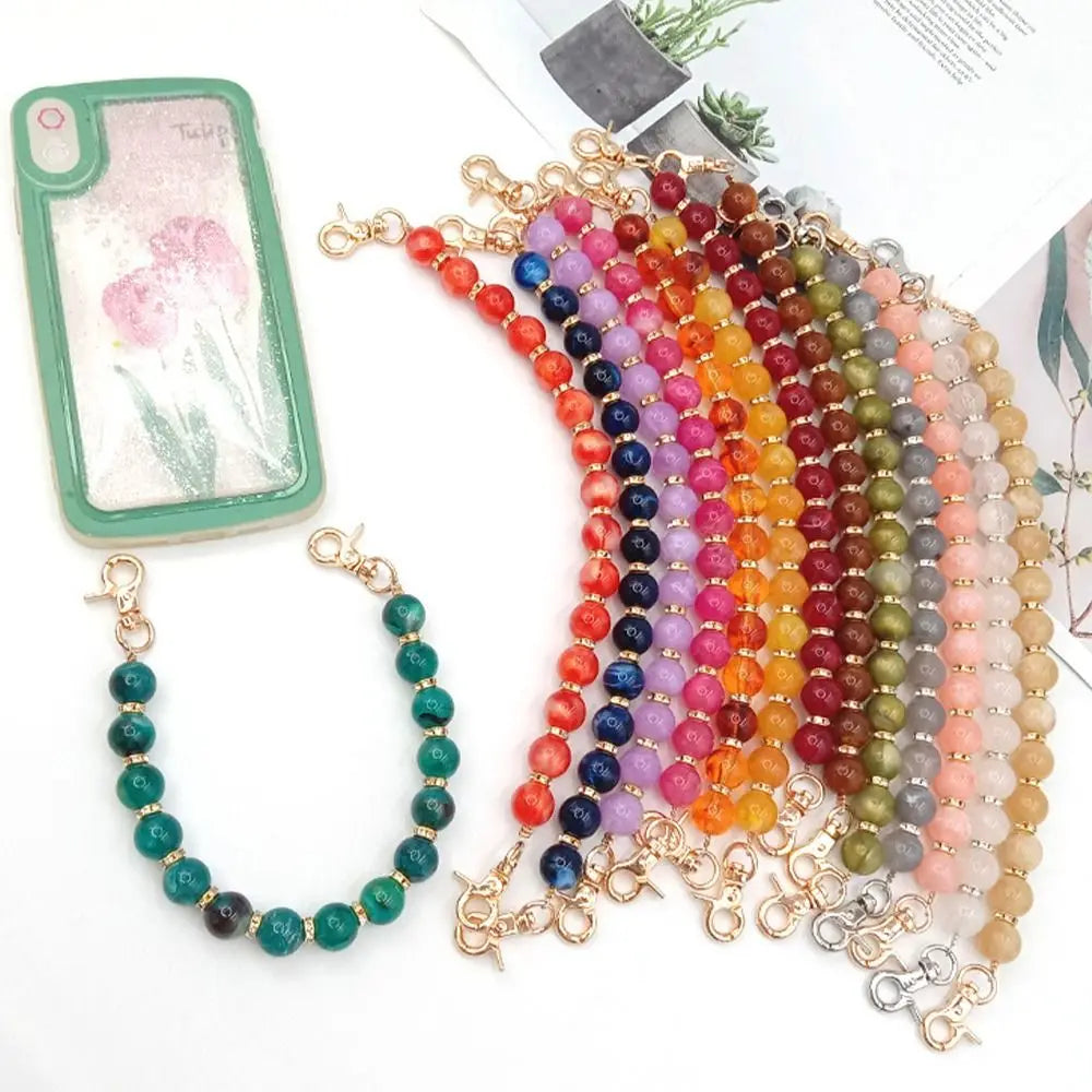 Handcrafted resin stone bead bag chain featuring a rainbow gradient of colorful beads.