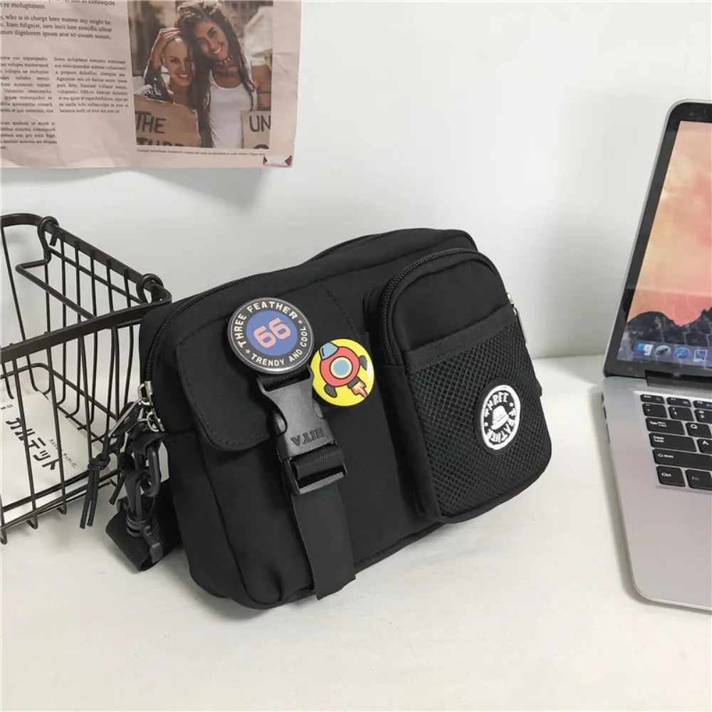 A black quick-dry canvas shoulder bag with a leather strap and a circular badge featuring the number 66.