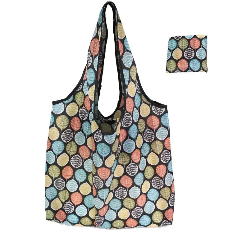 A reusable fashion shopping tote bag featuring a pattern of various leaf colors.