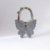 Silver foldable butterfly shaped hook for handbags