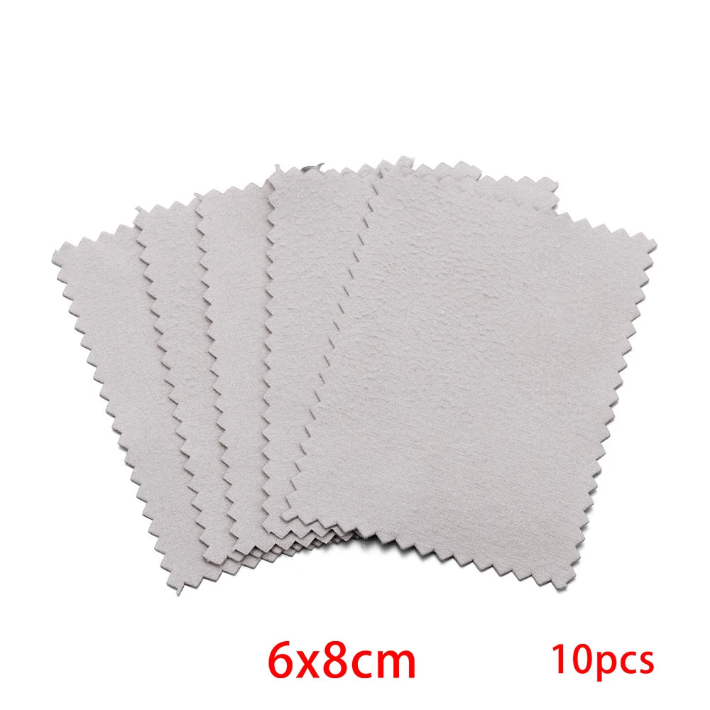 A set of ten gray polishing cloths, measuring 6x8cm each.