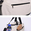 A beige waterproof sports duffel bag with black straps and a zippered compartment, featuring a blue water bottle.