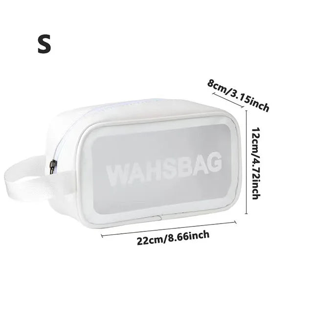 A clear waterproof travel toiletry bag with white trim and measurements displayed.