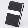 A black textured PU leather business card holder with a white card slot.