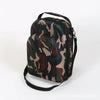 A camouflage patterned storage bag with a black strap and a baseball hat is shown against a white background.