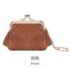 A brown leather coin purse with a gold-toned clasp and chain attached to the top.