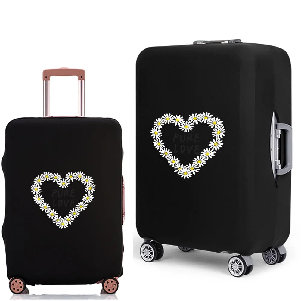A black rolling suitcase with a heart design featuring the text Pure Love on the cover.