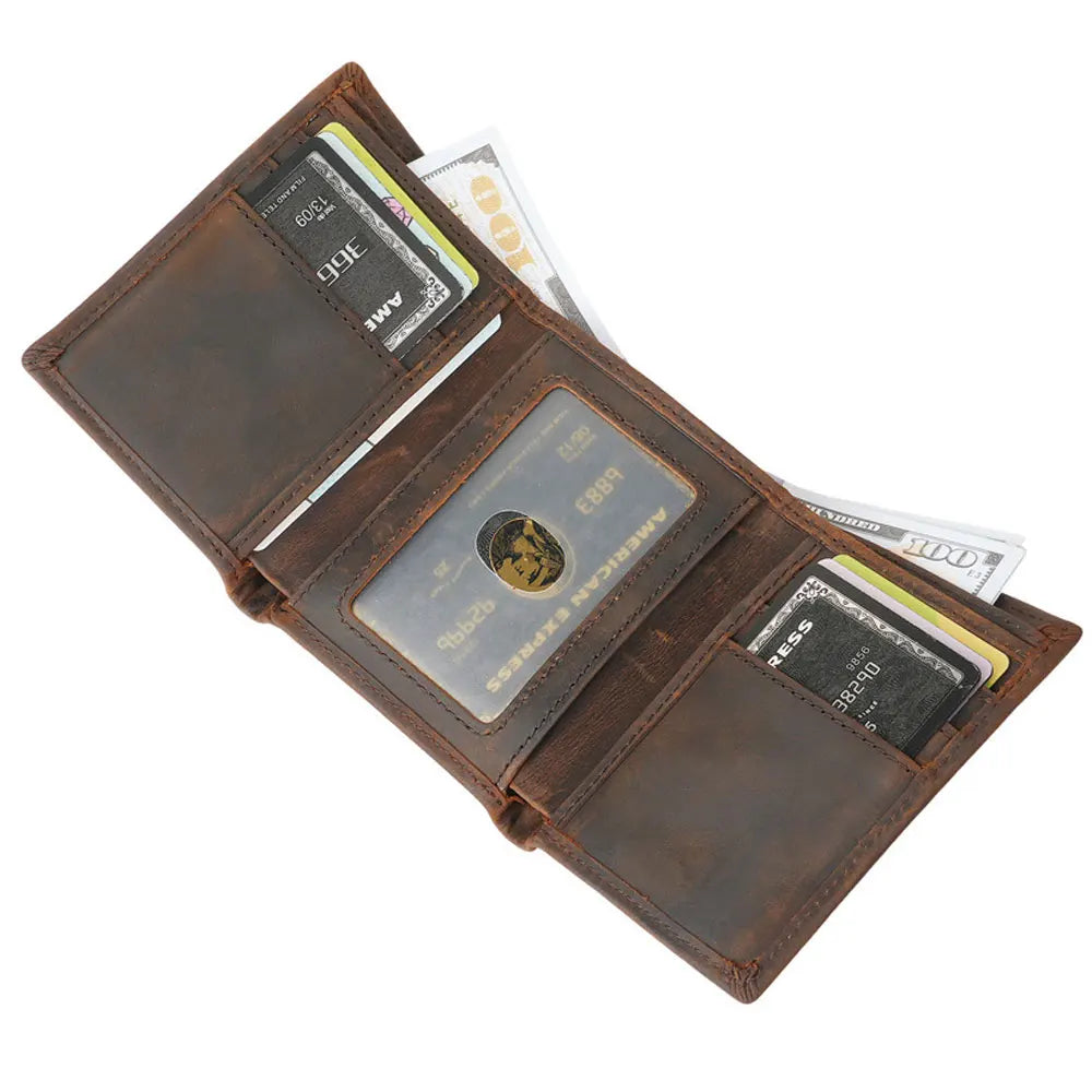 A brown leather trifold wallet displaying various cards and cash inside.