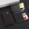 A black slim PU leather credit card wallet with multiple cards and a matching leather sleeve displayed on a dark surface.