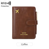 Brown leather travel wallet with gold embossed airplane logo and zipper.