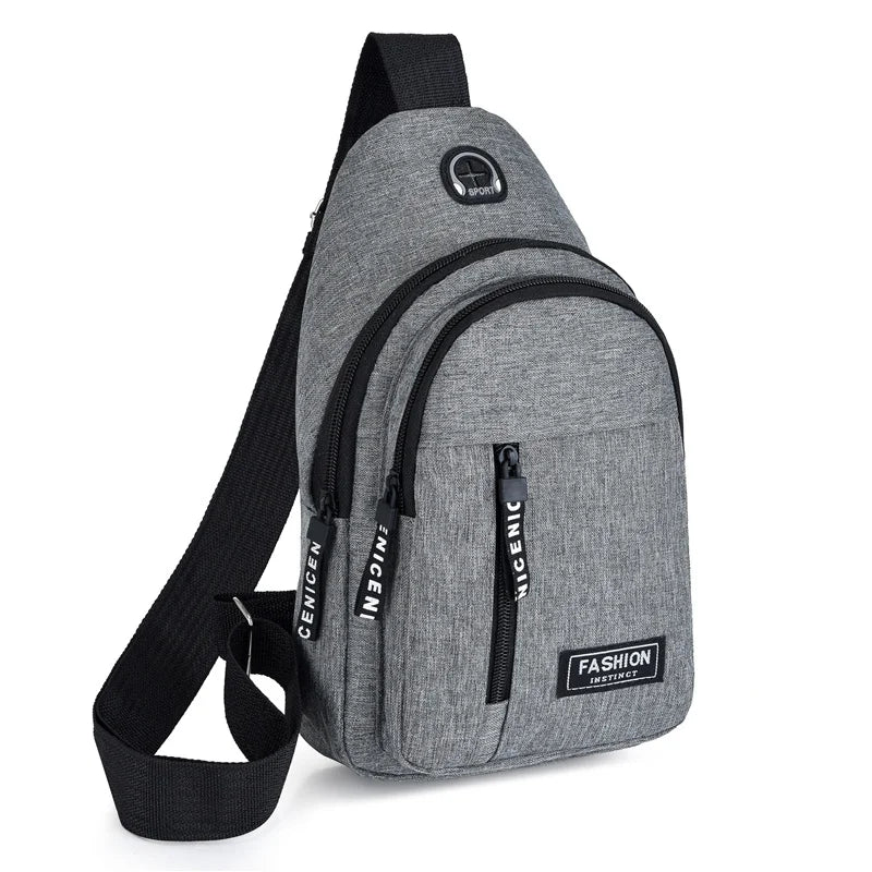 A gray water-resistant casual chest bag with a black strap and a zippered phone pocket.