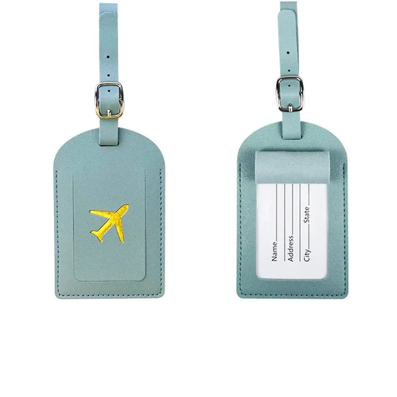 Light mint green PU leather passport holder with card slots and a small airplane charm