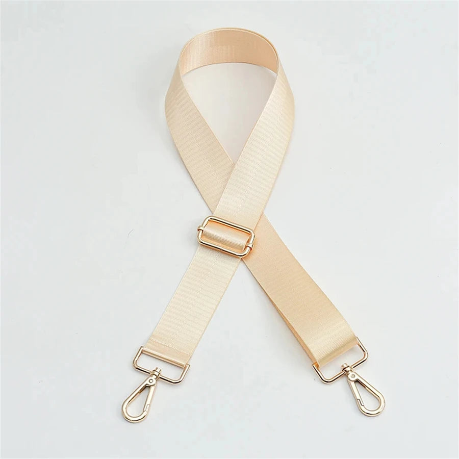 A beige nylon adjustable shoulder strap for bags shown diagonally.
