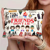 A beige zippered makeup bag featuring a Friends Don't Lie theme with various character illustrations.