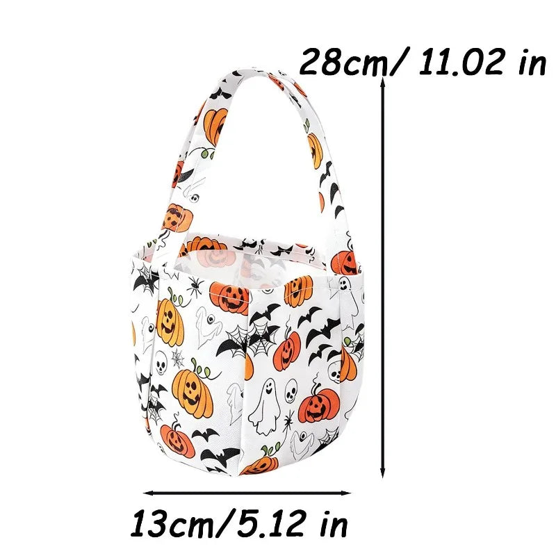 A white non-woven tote bag featuring a pattern of Halloween designs including pumpkins, ghosts, bats, and skulls.