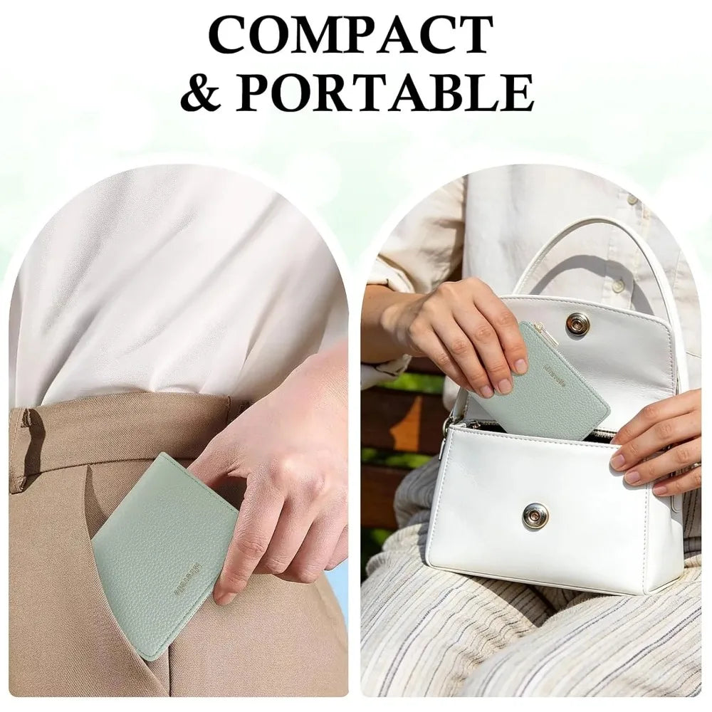 A close-up of a light mint green slim bi-fold wallet being held by a person, emphasizing its compact and portable design.