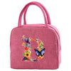 Pink insulated canvas lunch bag featuring a large letter D decorated with colorful flowers and butterflies