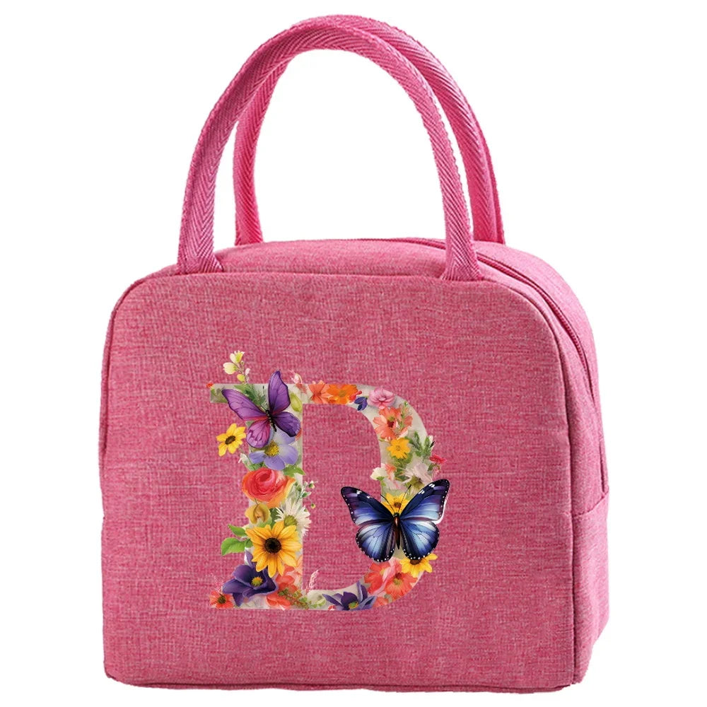 Pink insulated canvas lunch bag featuring a large letter D decorated with colorful flowers and butterflies