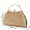 A beige pleated evening handbag with a gold top handle and chain strap shown in profile.