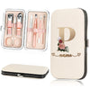 A beige cosmetic pouch containing a stainless steel nail clipper set and a large matching cosmetic case.