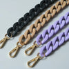 Three adjustable long bag straps in black, beige, and purple colors displayed diagonally.