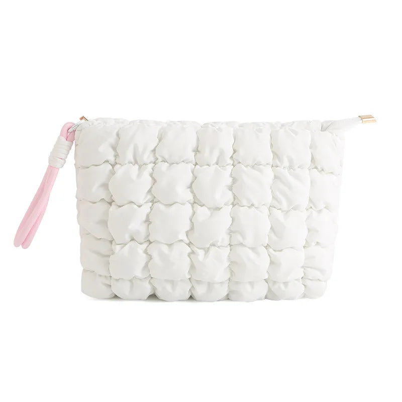 White quilted puffer makeup bag with pink strap