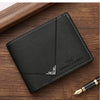 A black men's slim leather bi-fold wallet resting on a wooden surface.