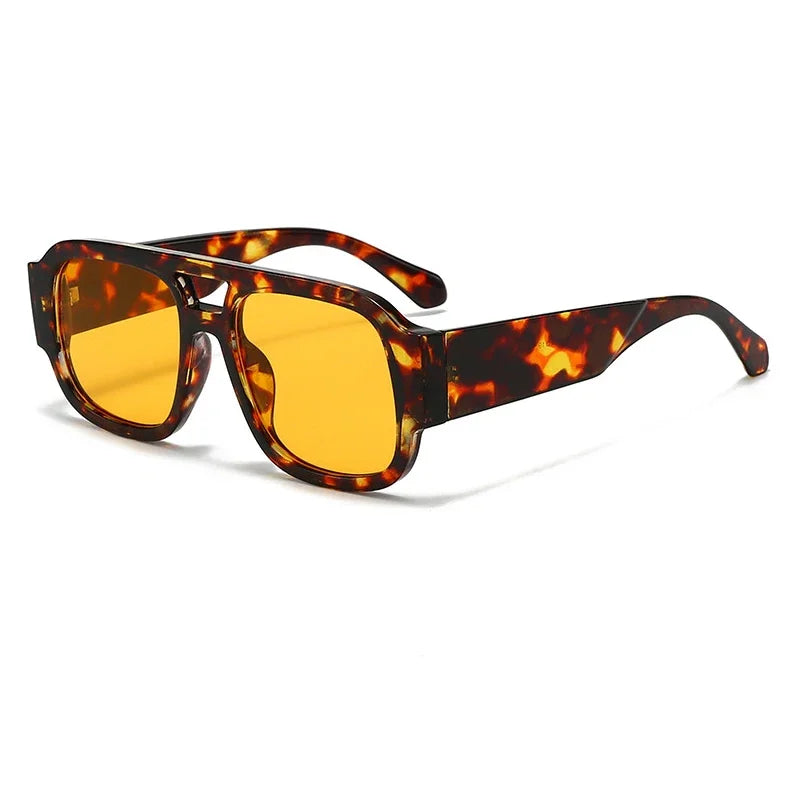 Vintage leopard print oversized square sunglasses with amber lenses and tortoiseshell frames.