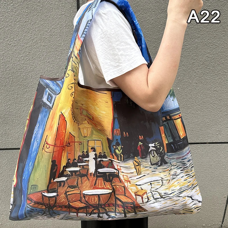 A canvas print depicting a vibrant street scene with people and architecture on a foldable nylon shopping tote.