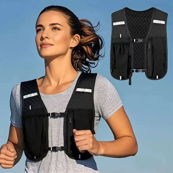 A woman wearing a black hydration vest backpack for running or cycling.