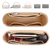 A tan felt purse organizer insert showing various small leather bags and a zippered compartment with accessories.