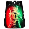 A black backpack featuring a graphic print of a soccer player in a red and green glow.