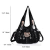 Black vintage PU leather hobo shoulder bag with gold hardware shown against a white background.