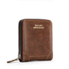 A brown leather wallet with gold lettering and a zipper is shown against a white background.
