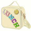 A cream-colored insulated lunch bag with a yellow smiley face patch and purple, blue, and green lettering.