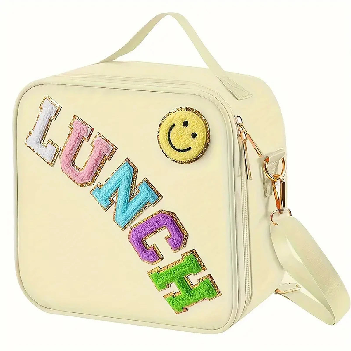 A cream-colored insulated lunch bag with a yellow smiley face patch and purple, blue, and green lettering.