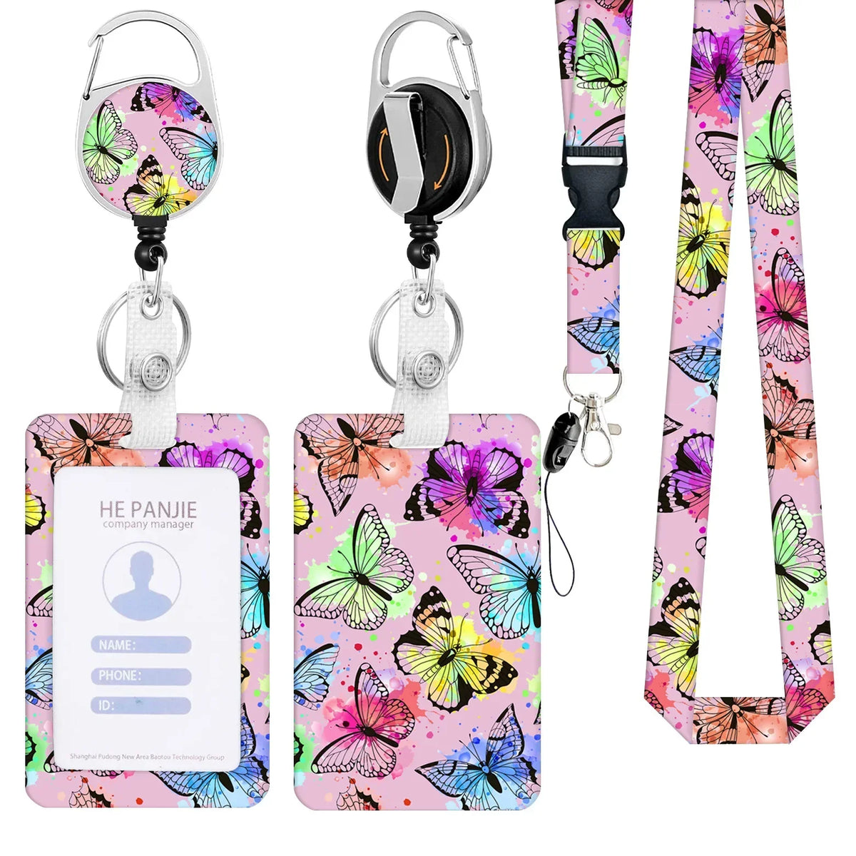 A set of pink and green floral patterned badge reels with silver clasps and black neck straps.