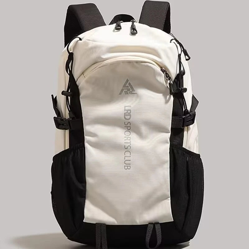 A white and black durable 80L waterproof hiking backpack viewed from the back.