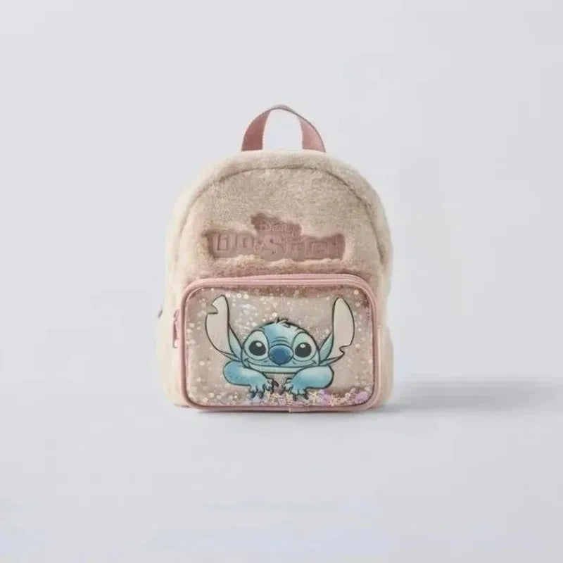 A light pink fuzzy backpack featuring a blue Stitch character design.