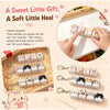 A set of adorable cat keycap fidget toys and bag charms in various pastel colors and designs.